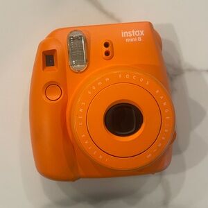 Orange Fuji Instamax Mini 8 Polaroid camera